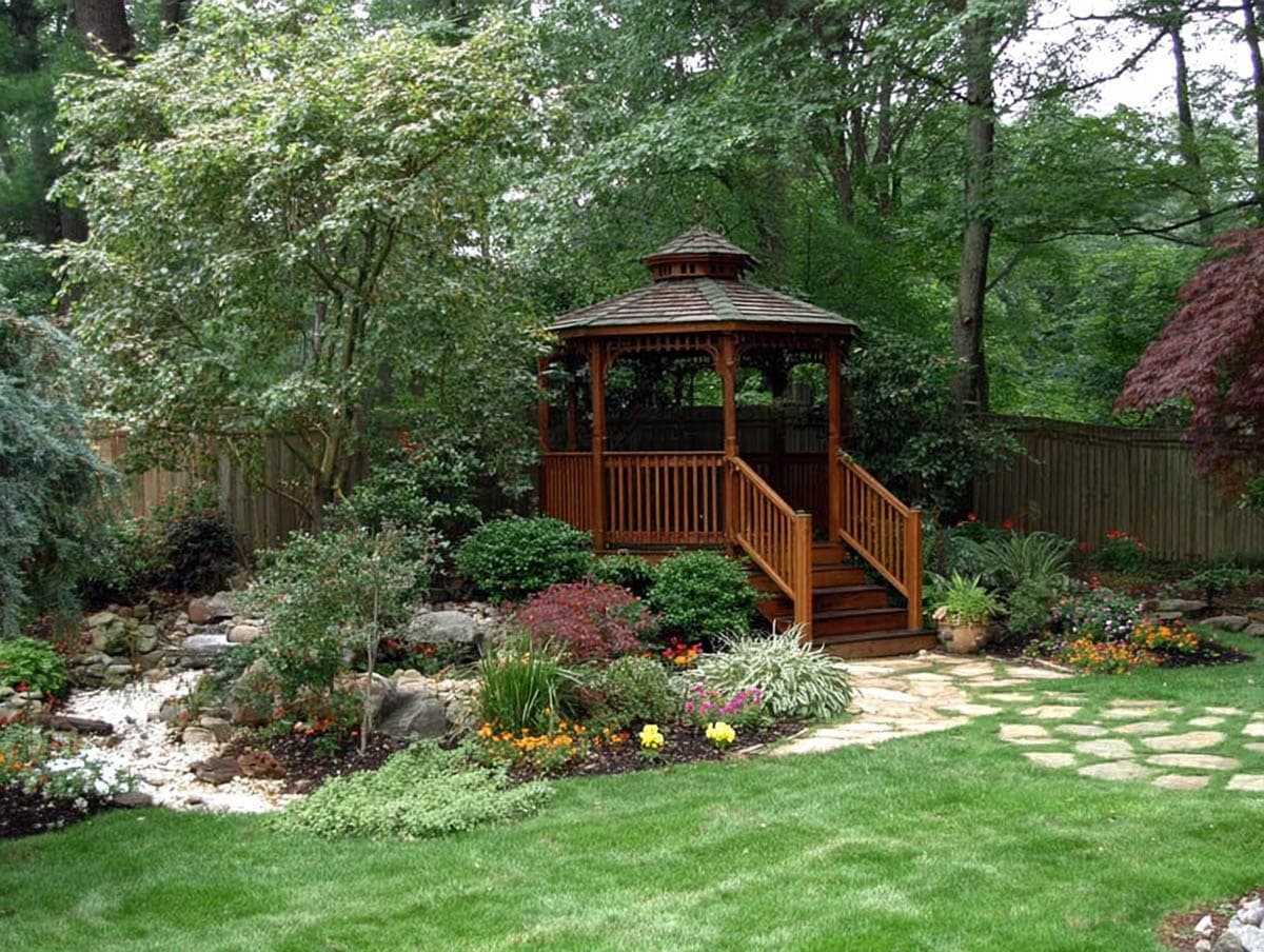 Backyard garden with small wood octagon gazebo