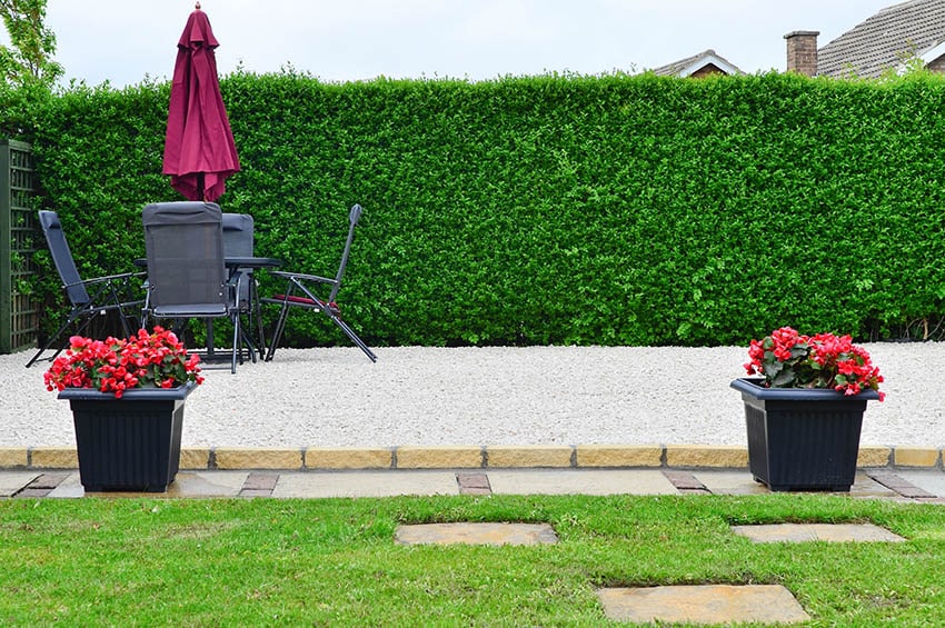 Crushed gravel patio with outdoor dining table