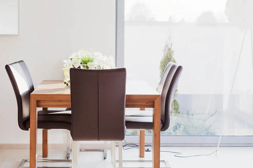 Leather seat chairs with wood table