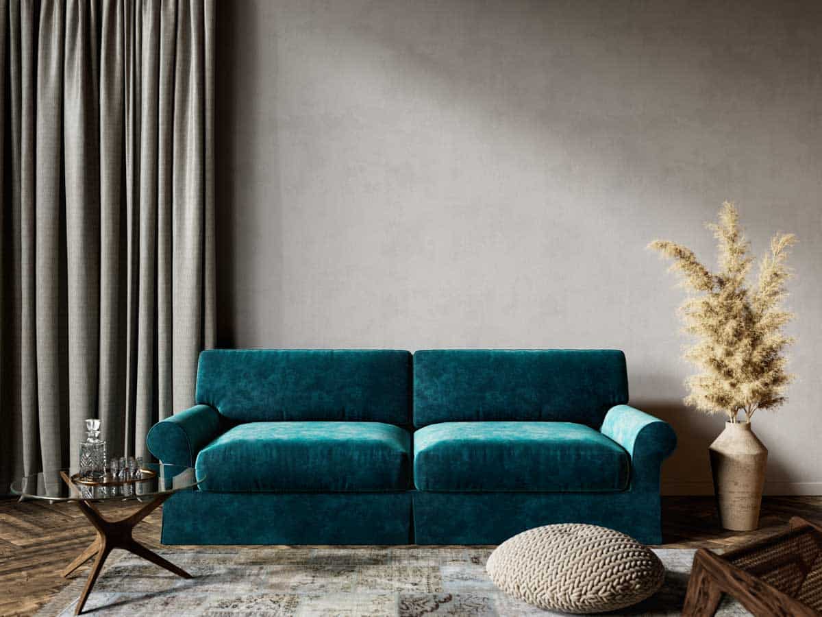 living space with velvet sofa