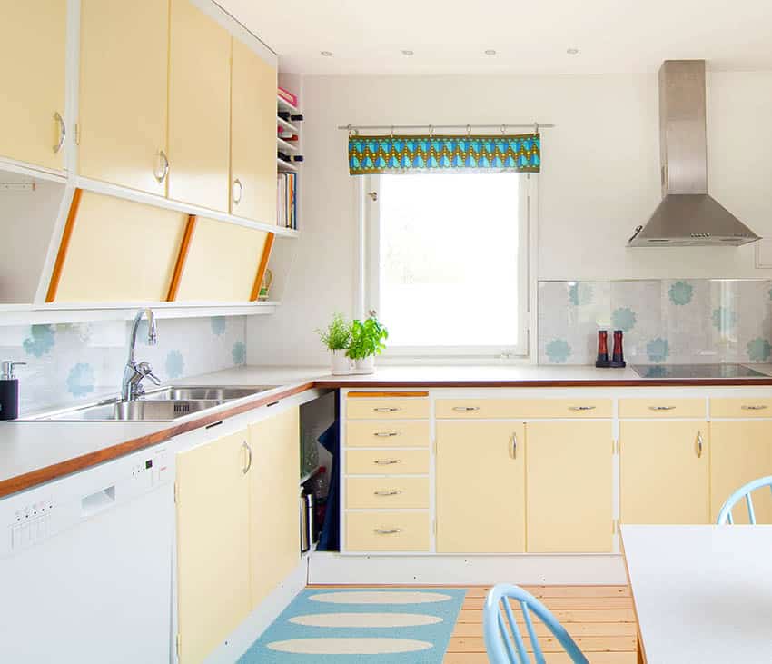 Retro 1950s kitchen with yellow cabinets