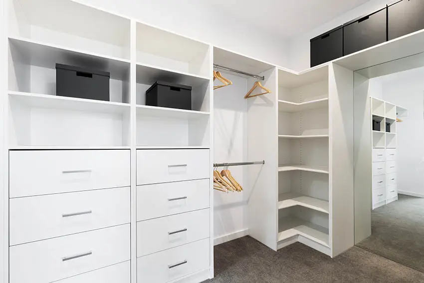 Walk in closet with mirror built in storage clothing hangers