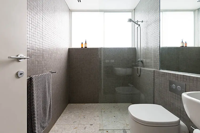 Wet room bathroom with terrazzo tile floor