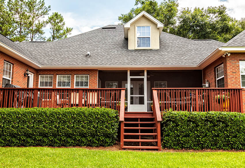 Backyard deck with plants for skirting