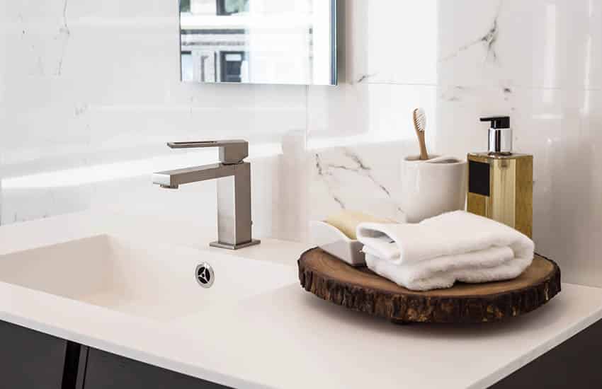 Bathroom with white countertop vanity