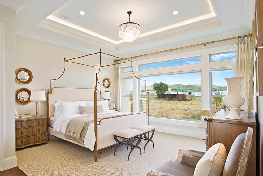 Bedroom with recessed ceiling lights chandelier indirect light in tray ceiling