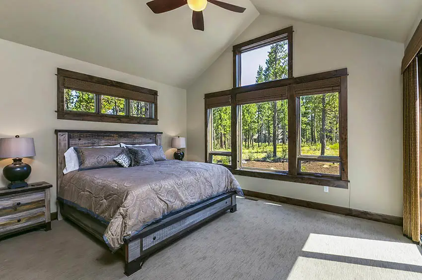 Craftsman style bedroom with wood frame windows