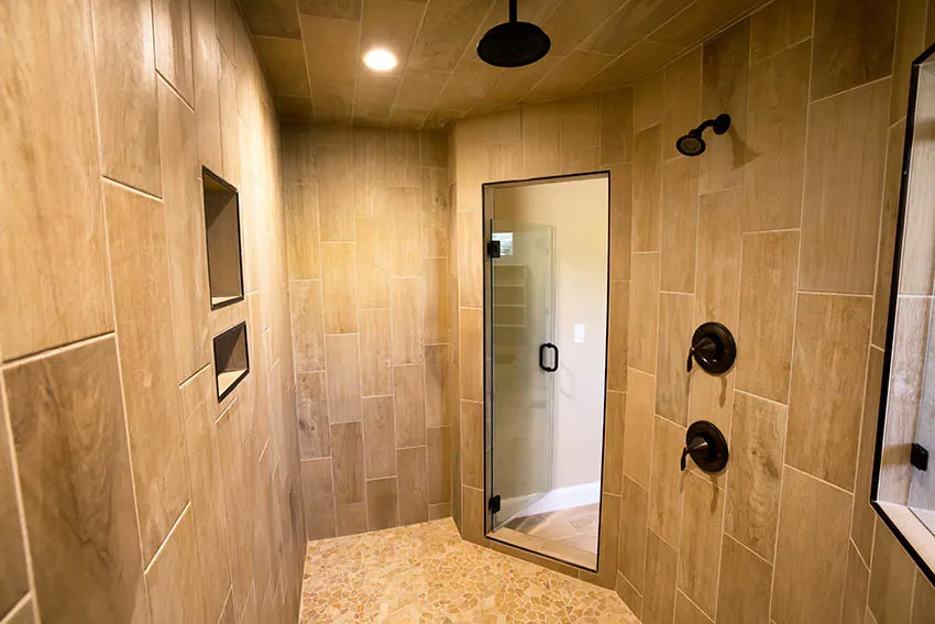 Custom walk in shower with wall niches