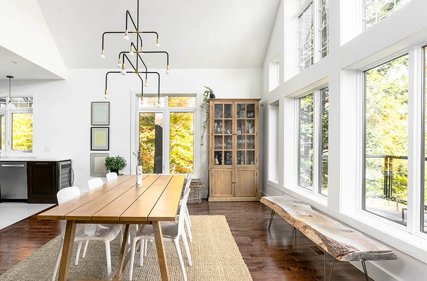 Dining room with modern sculptural chandelier with wood elements