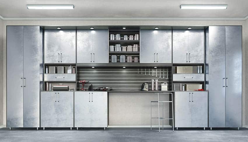 Garage with utility lighting and metal storage cabinets 