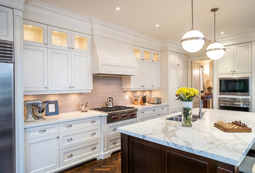 Kitchen with globe pendants above island