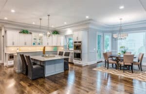 Kitchen With Raised Island And Built In Table Is 300x193 