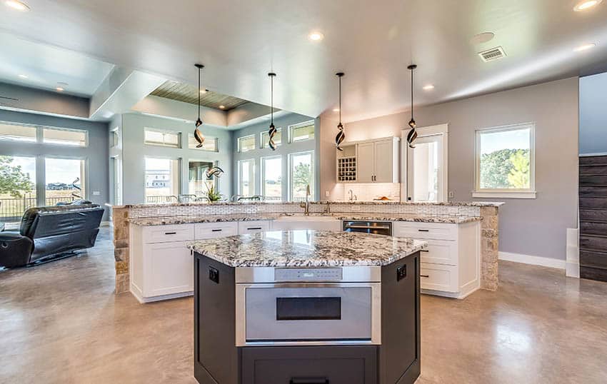 Kitchen with expansive layout, two level island bar and island 