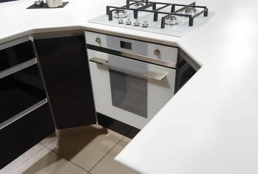 Kitchen with white solid surface corian countertops