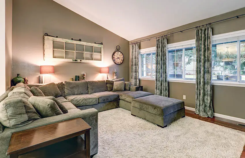 Large grey velvet sectional with matching ottoman