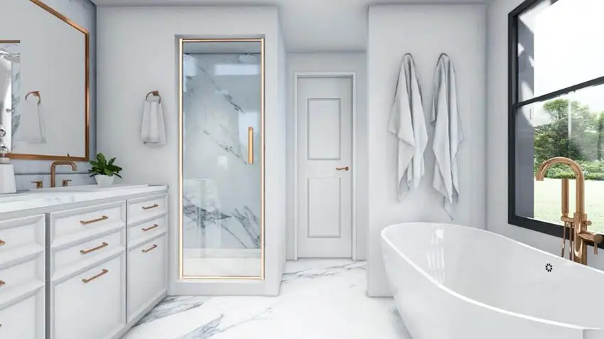 Master bathroom with freestanding tub steam shower marble floors