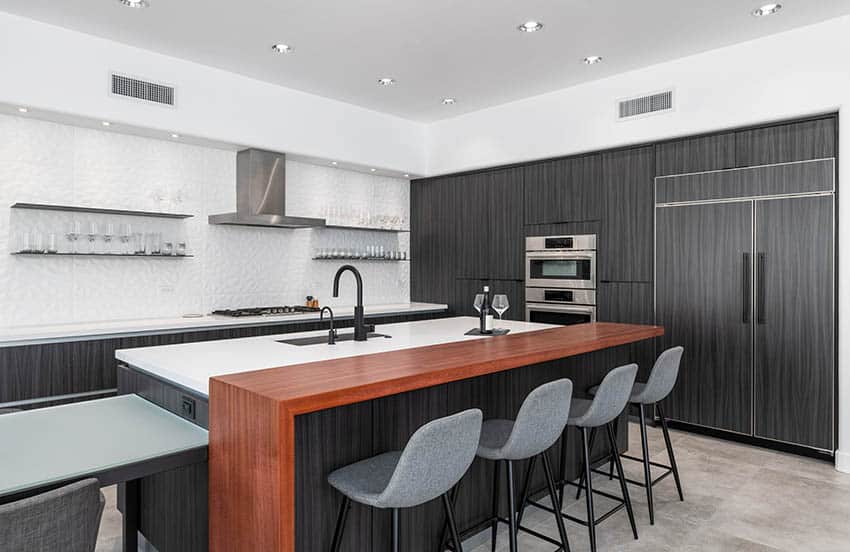 modern style kitchen with elevated wooden seating ledge on island