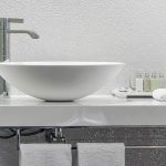 Bathroom vessel sink with chrome faucet