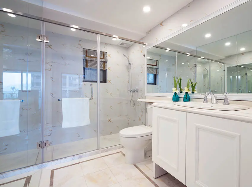 Bathroom with quartz shower walls white vanity