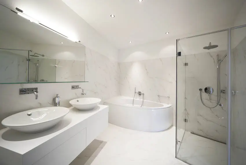 Bathroom with quartz walls walk in shower double vanity vessel sinks