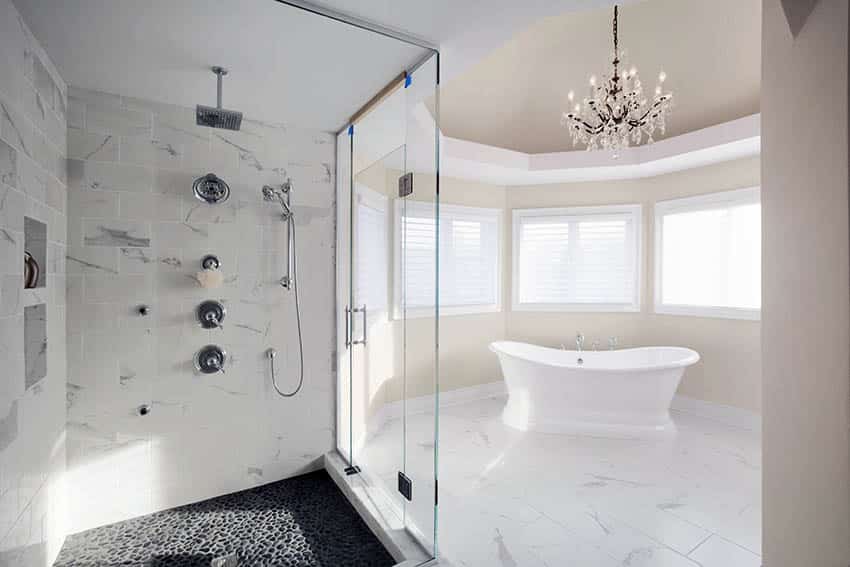 Luxury bathroom with rainfall shower head freestanding tub