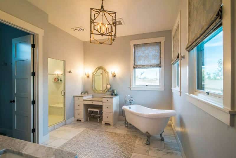 Master bathroom with clawfoot tub and make up vanity