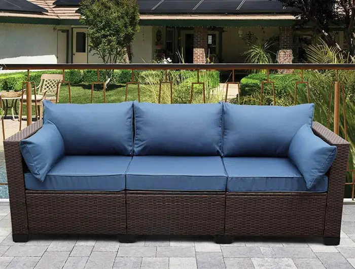 Outdoor sofa with blue cushions