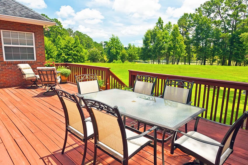 Wood deck with aluminum furniture