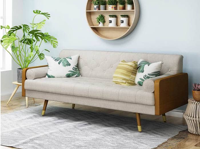 Beige polyester mid century modern sofa in living room