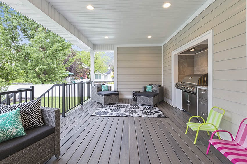 Composite deck with outdoor kitchen nook furniture