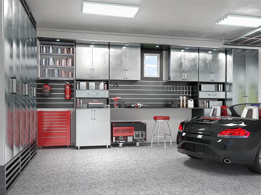 Garage with wall tool storage with recessed lights utility ceiling lighting epoxy floors