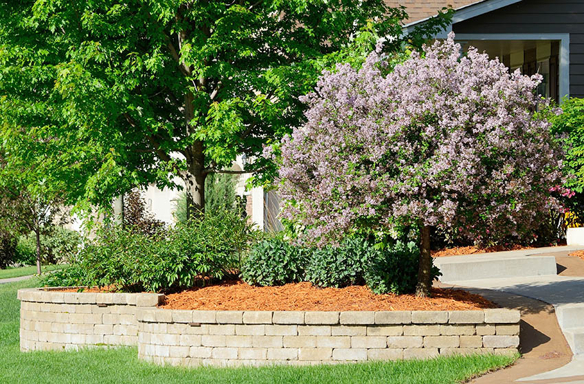 Garden landscaping with red cedar mulch