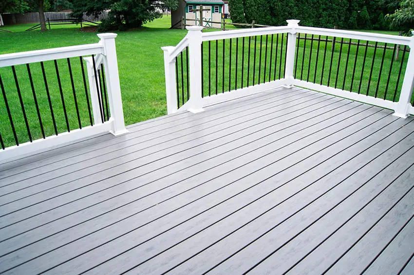 Gray pvc deck with white railing black supports