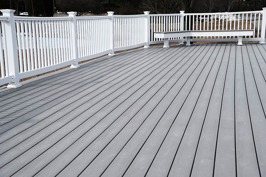 Gray pvc deck with white railing