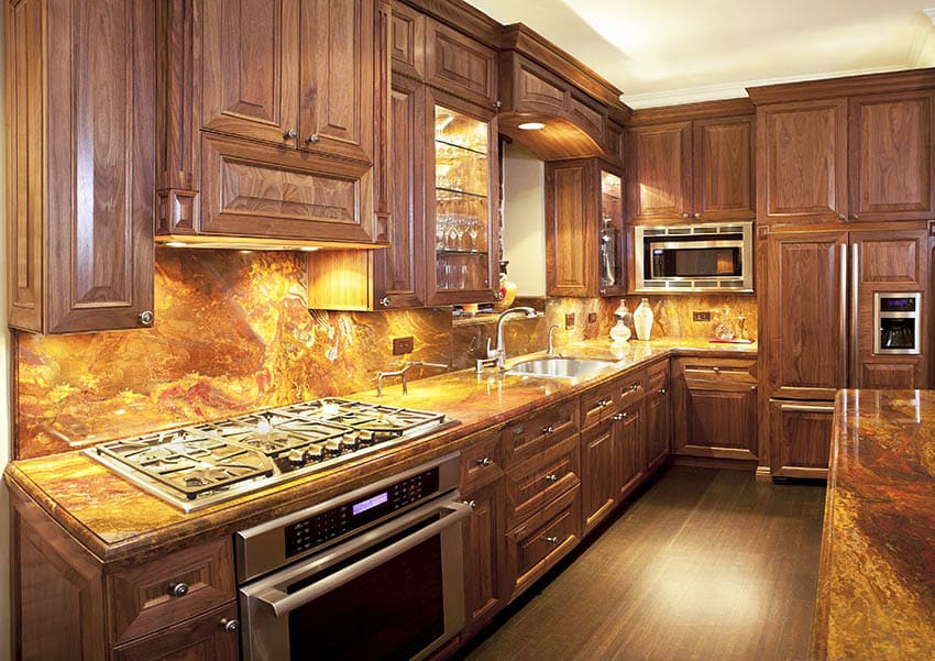 Kitchen with golden fantasy granite countertops solid wood cabinets