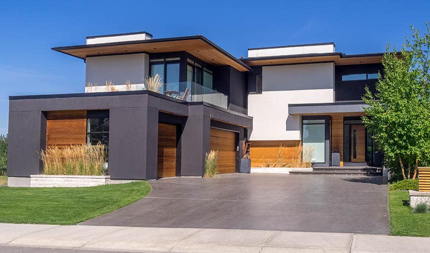 Modern house with stained concrete finish driveway