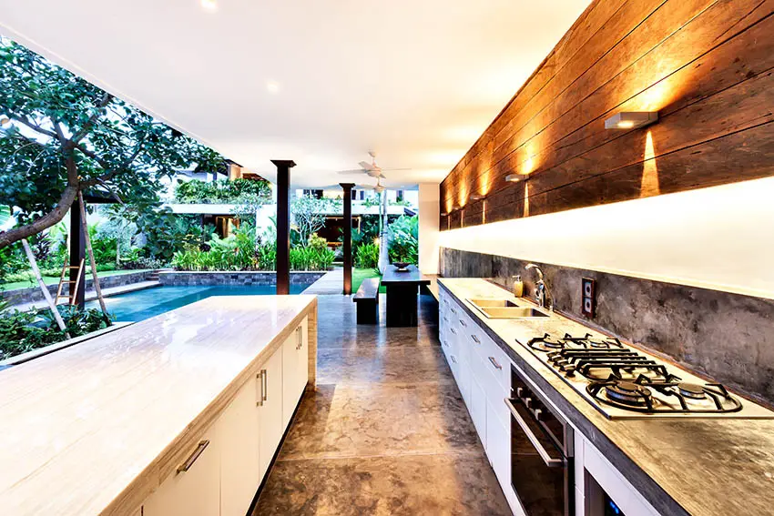 Stained concrete patio with outdoor kitchen