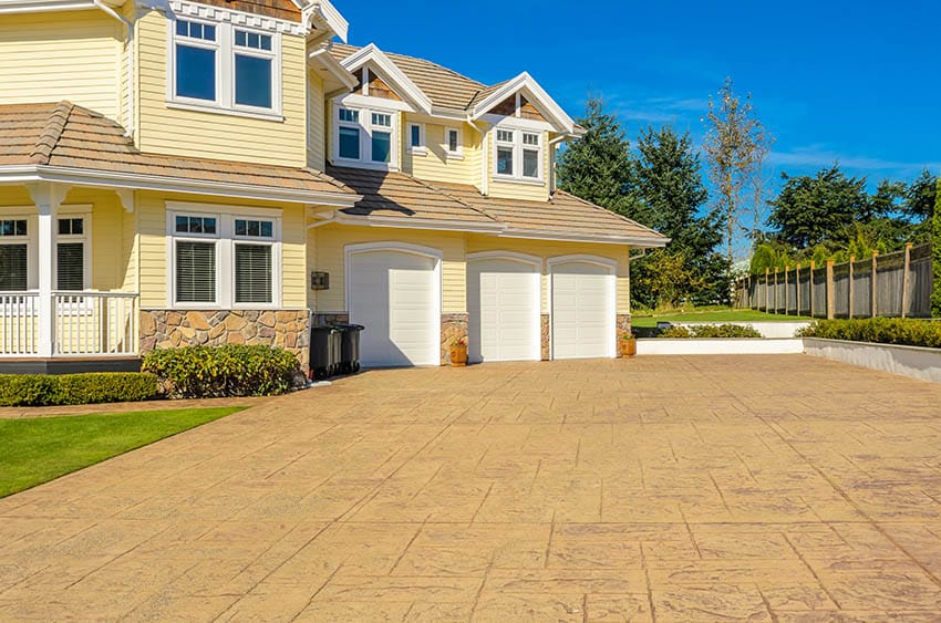 Stamped concrete surface leading to house