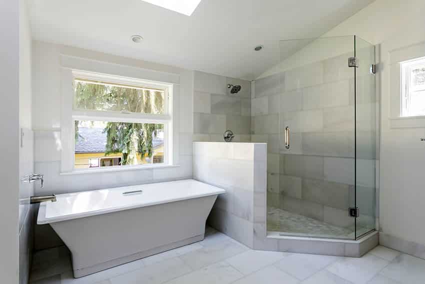 Bathroom with marble look ceramic tile glass shower