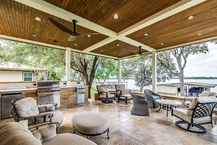 Covered patio with travertine pavers outdoor kitchen