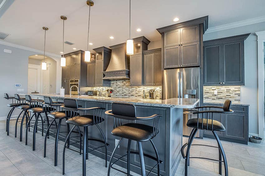 Kitchen with large grey ceramic floor tile dark gray cabinets long island with 7 bar stools