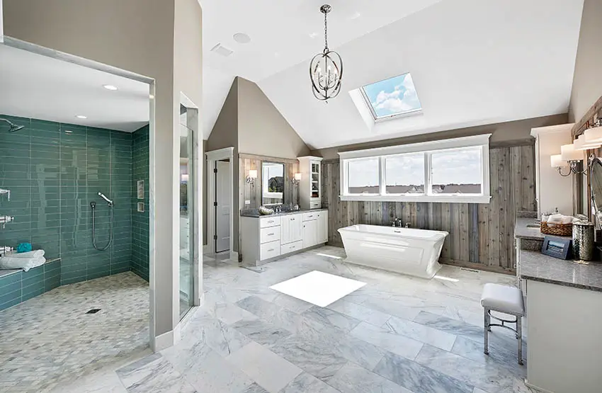 Bathroom with glass tiles in the shower area and beadboard walls in the bathtub area