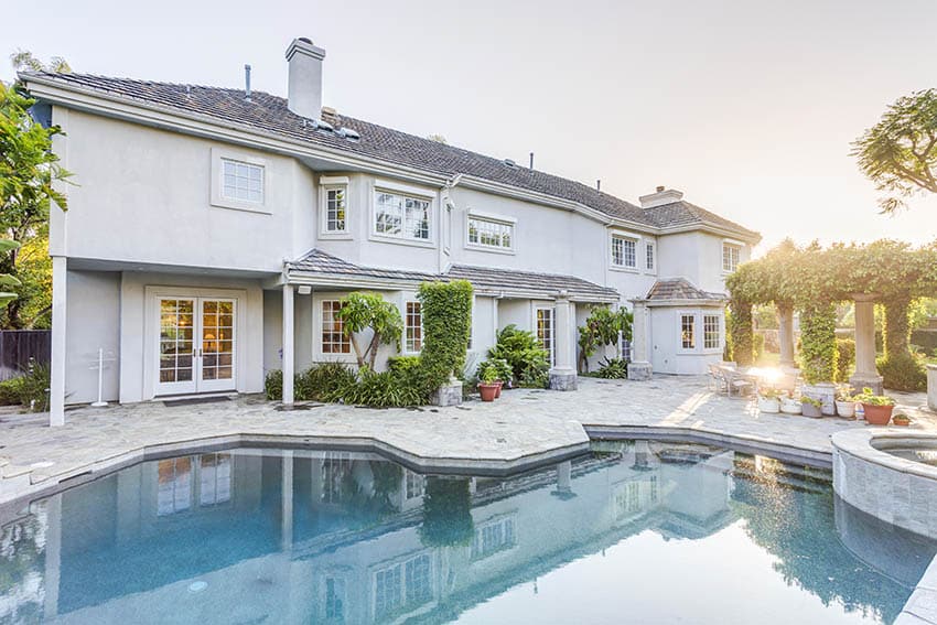 Luxury home with sand blasted marble tile and coping