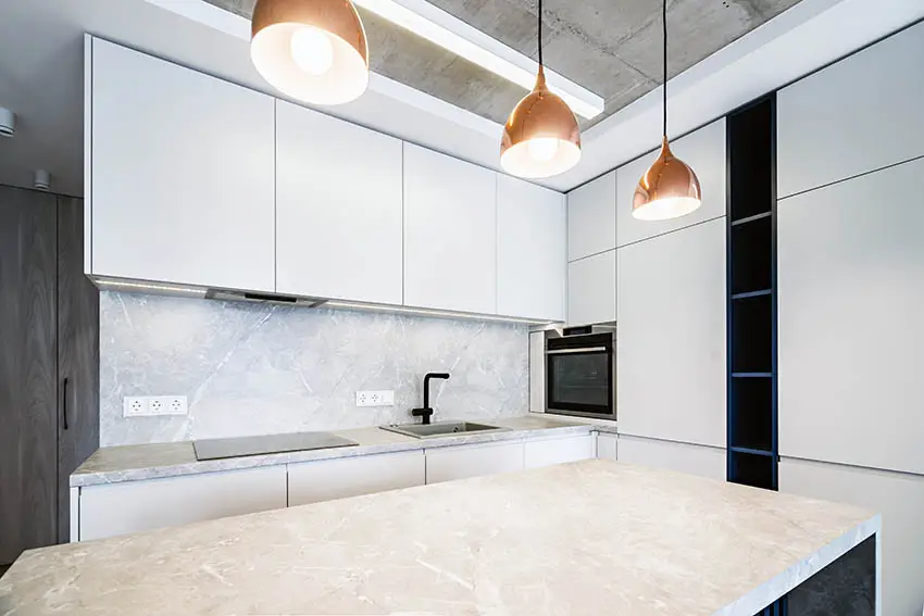 Modern kitchen with dekton countertops backsplash white cabinets