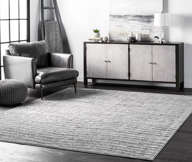 Modern polypropylene rug in living area corner