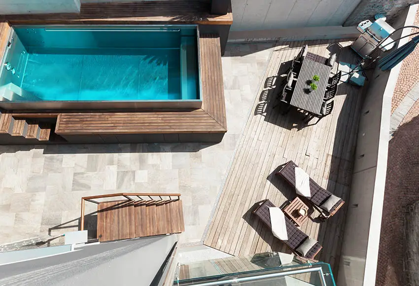 Travertine pavers patio around swimming pool
