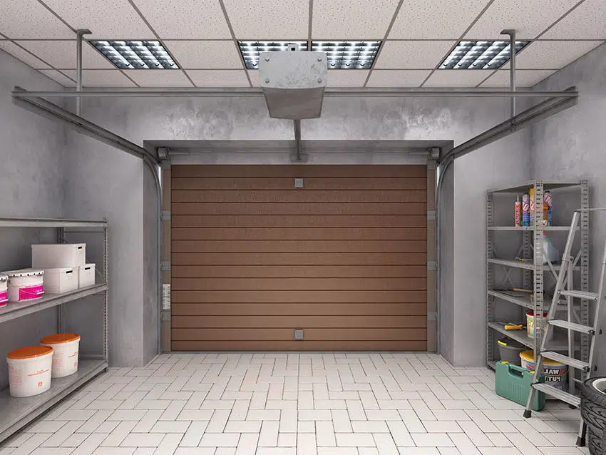 Garage interior with white paves brown door drop ceiling