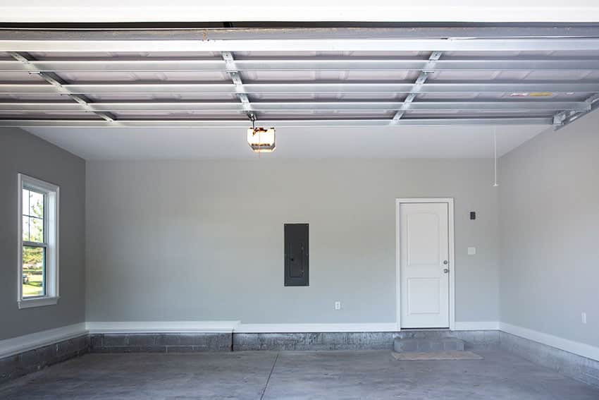 Garage with gray paint whtie door steel ceiling