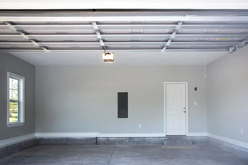 Garage with gray paint whtie door steel ceiling