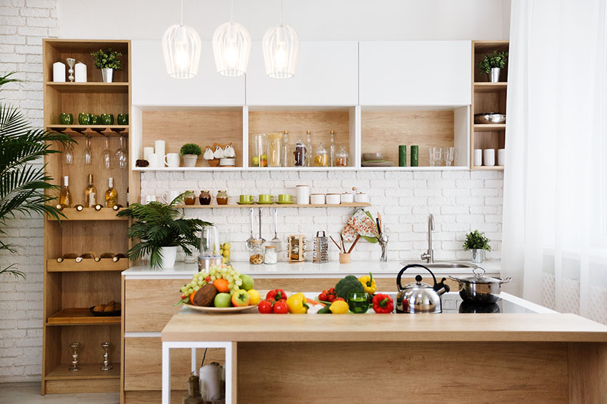 Rustic kitchen with small pantry wooden countertop white brick wall